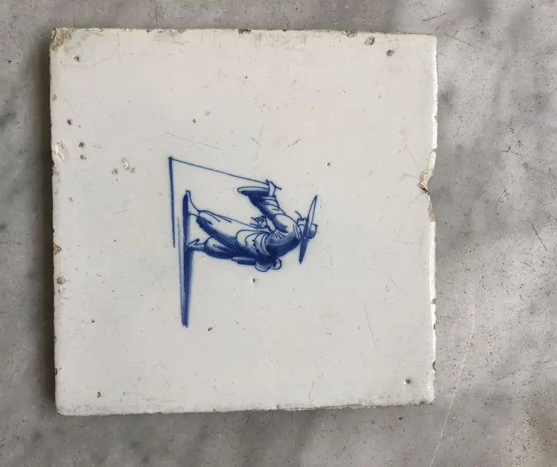 17 the century Delft tile with Chinese figure