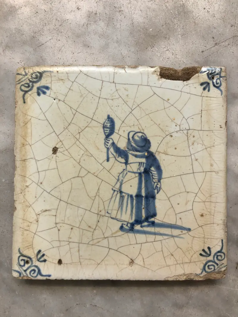 17th century Delft handpainted dutch tile with child