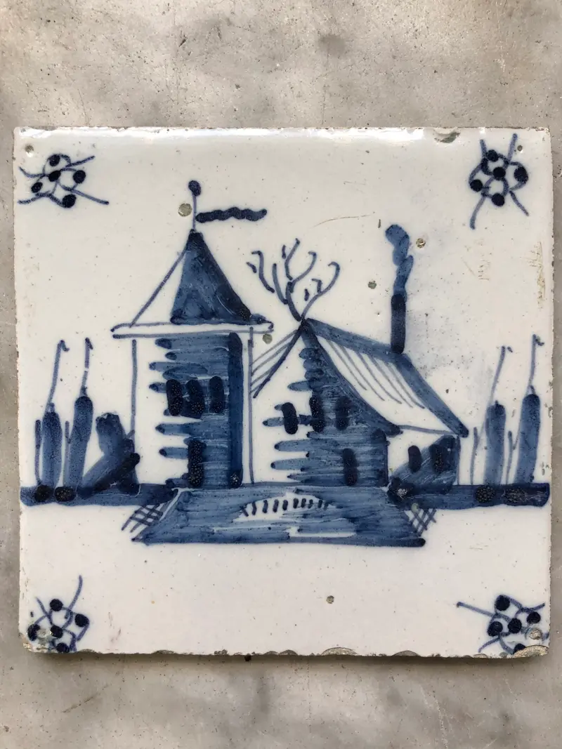 18th century Delft tile with landscape